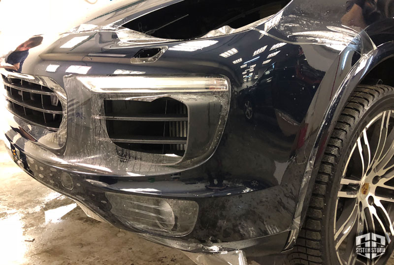 Porsche Cayenne защита полиуретаном бампера с подворотами